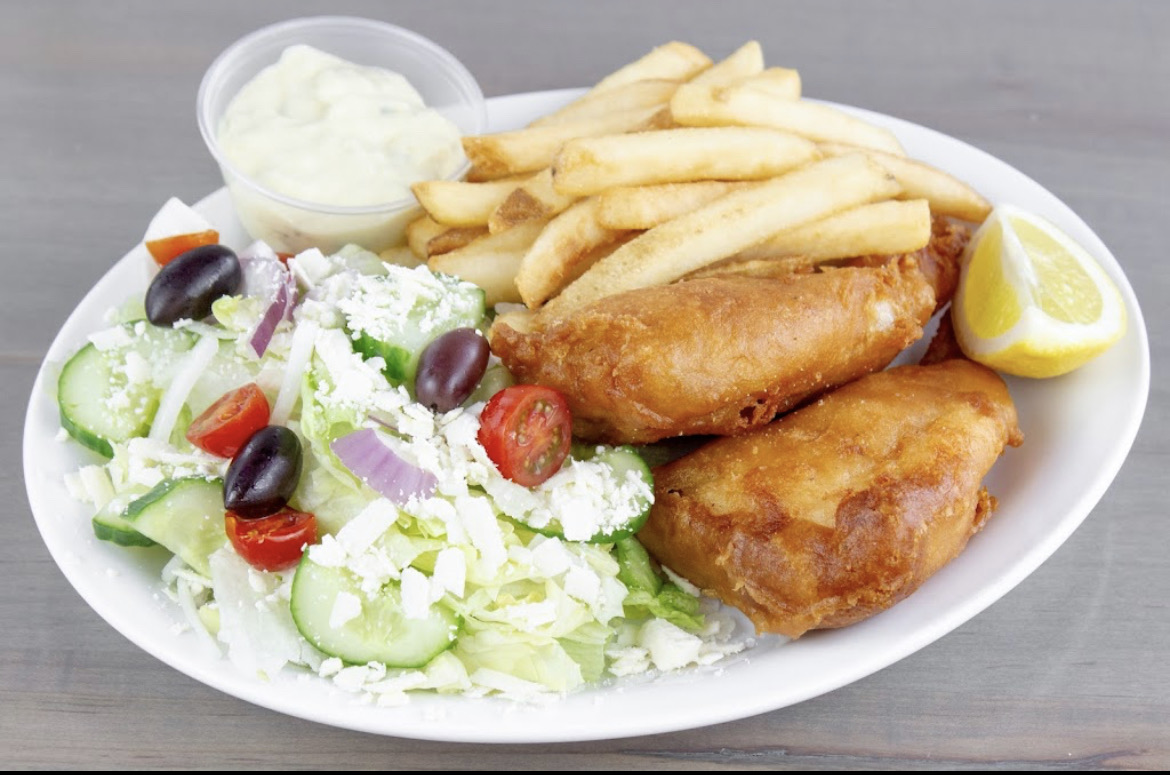 Greek dinner plate with gyros, rice, lemon potatoes and Greek salad
