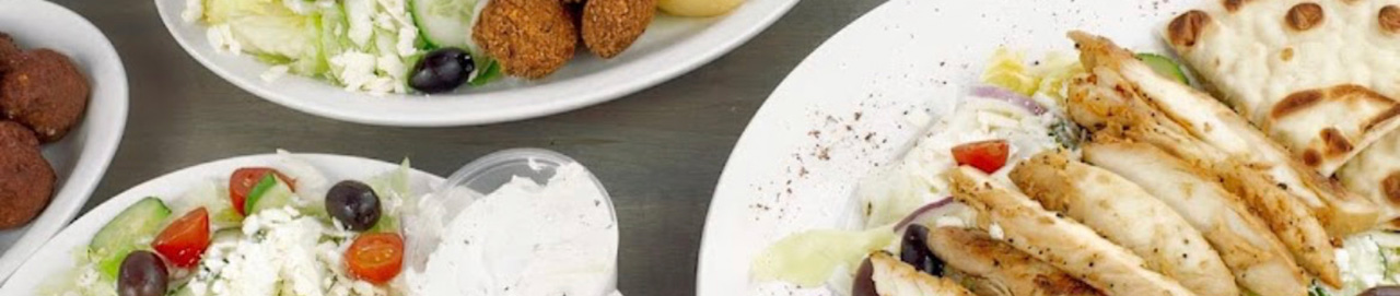 A wide spread of Greek catering dishes
